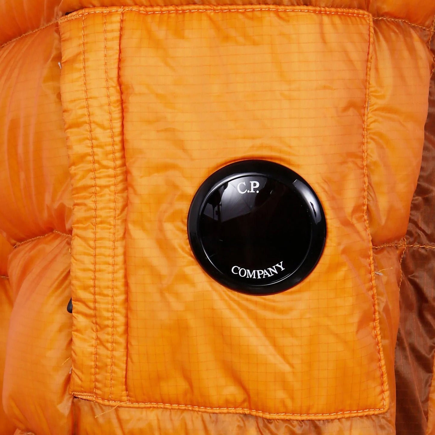 C.P. Company DD - Shell Down Lens Jacket in Russet OrangeCoats & JacketsC.P. CompanyDPUS Designer Outlet7622792422933SC.P. Company DD - Shell Down Lens Jacket in Russet Orange