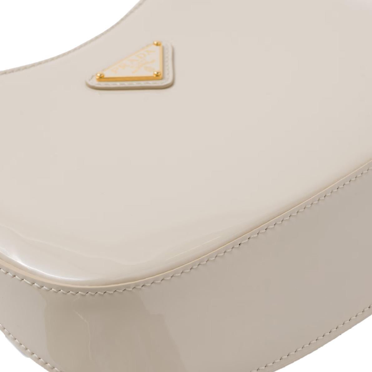 Prada Cleo Shoulder Bag in Cream PatentBagsPradaDPUS Designer Outlet330259Prada Cleo Shoulder Bag in Cream Patent