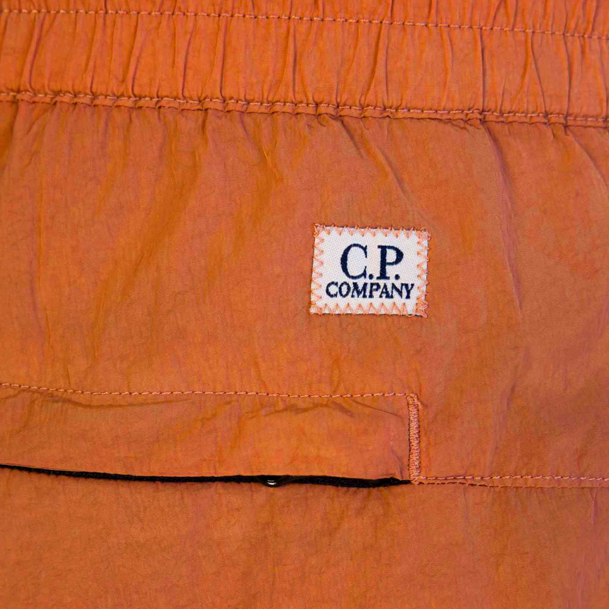 C.P. Company Chrome-R Track Pants in Pumpkin