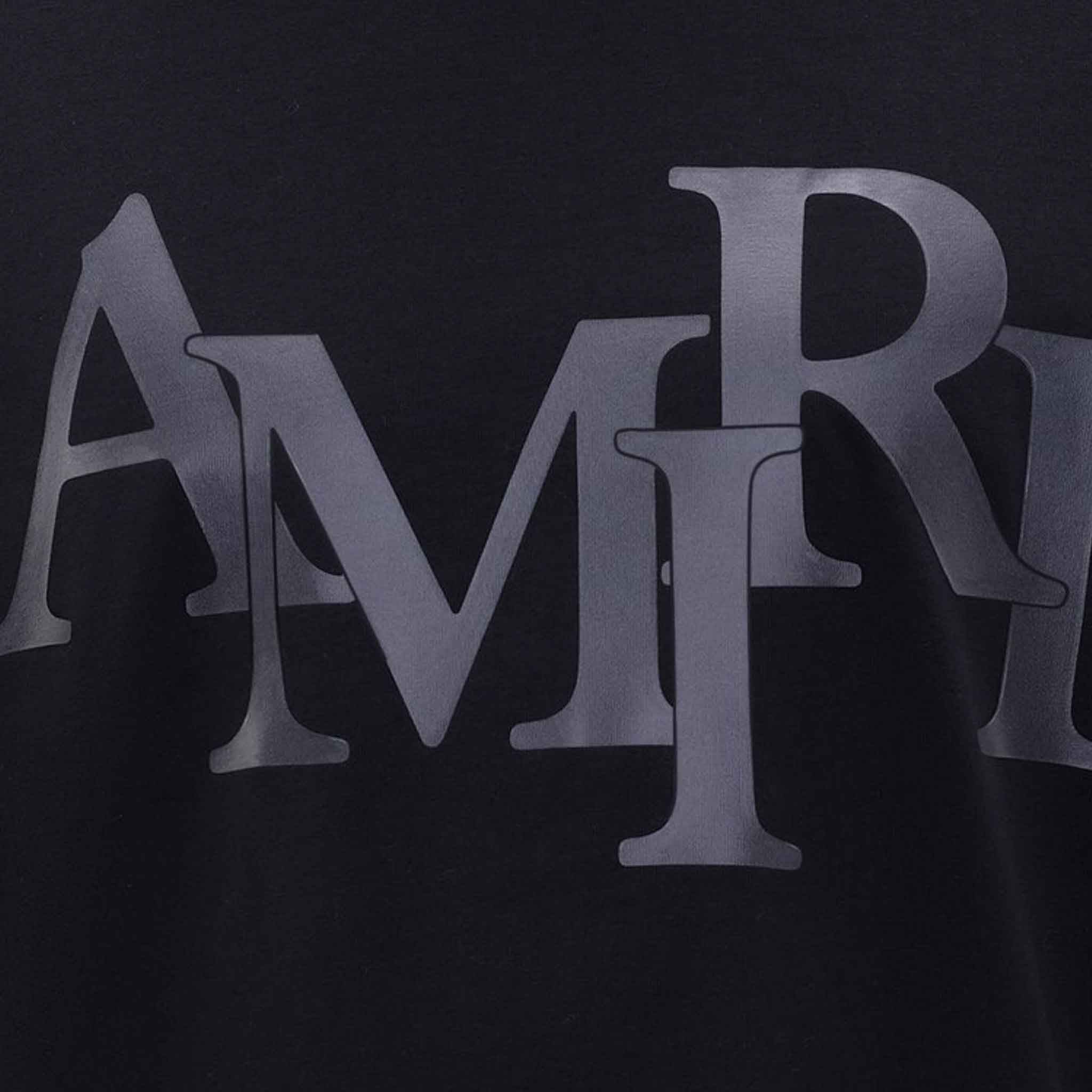 Amiri Staggered Logo T-Shirt in Black