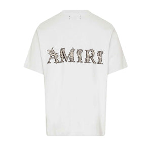 Amiri Baroque Logo T-Shirt in Gray DawnT-ShirtsAmiriDPUS191846552867SAmiri Baroque Logo T-Shirt in Gray Dawn