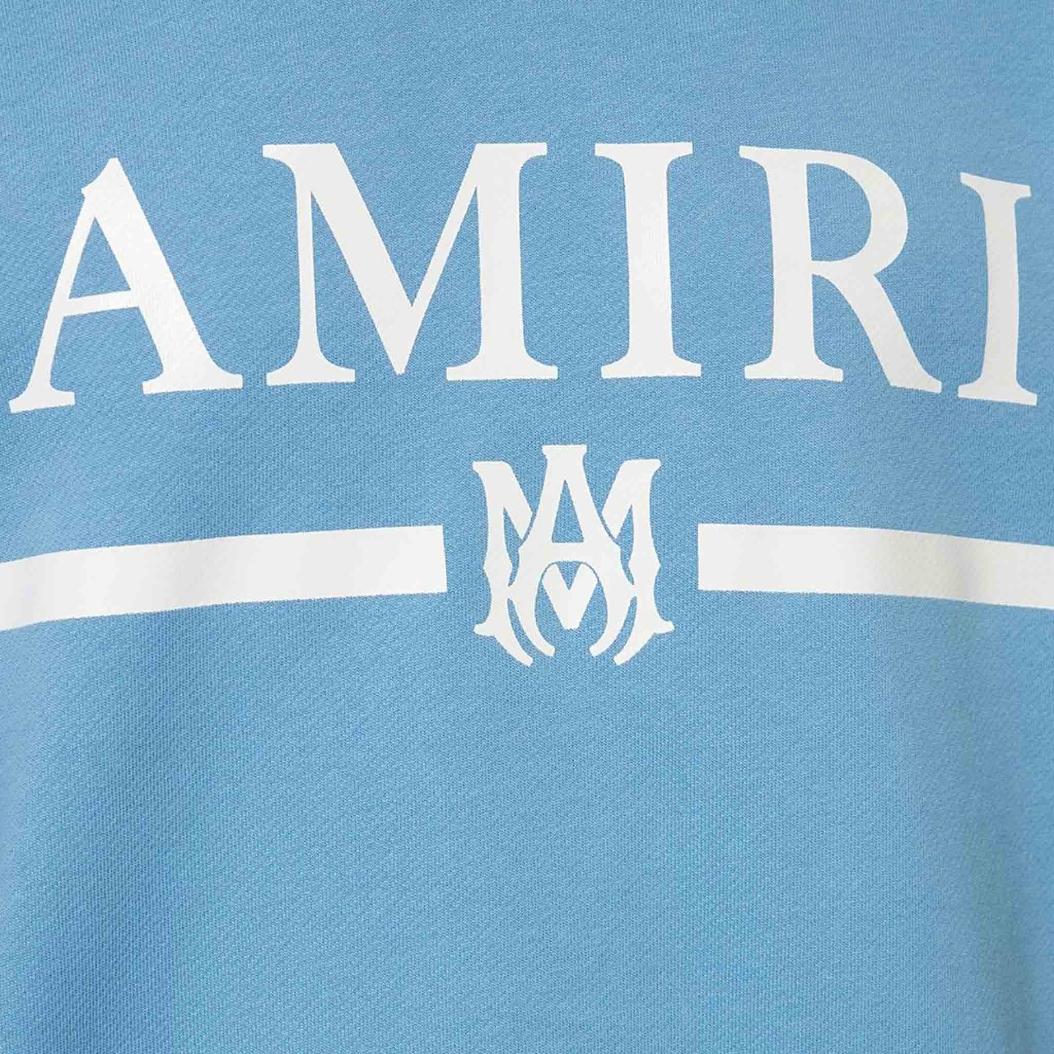 Amiri MA Bar Logo Crewneck Sweat in Carolina BlueHoodiesAmiriDPUSXSAmiri MA Bar Logo Crewneck Sweat in Carolina Blue