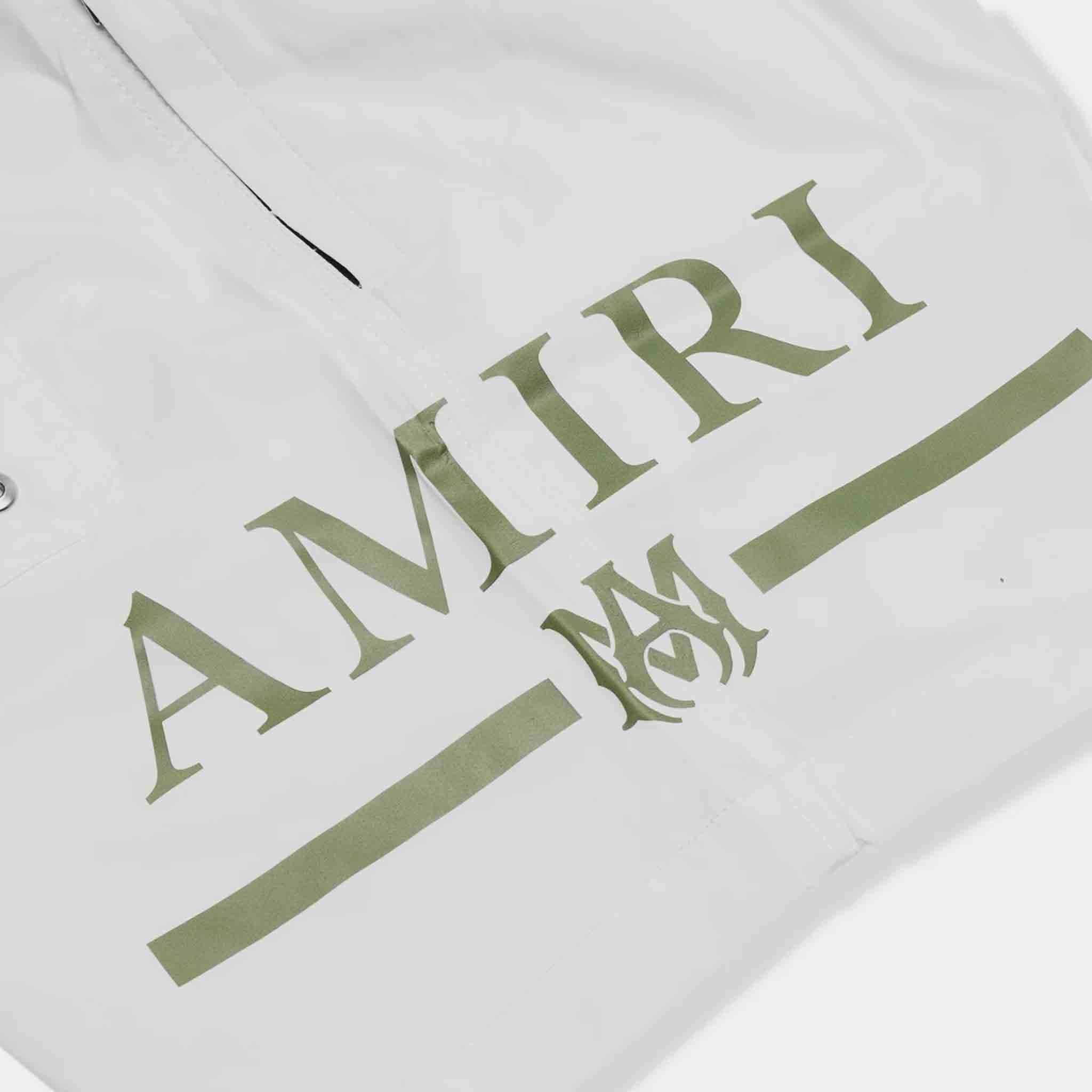 Amiri MA Bar Logo Swim Trunks in WhiteShortsAmiriDPUSXSAmiri MA Bar Logo Swim Trunks in White