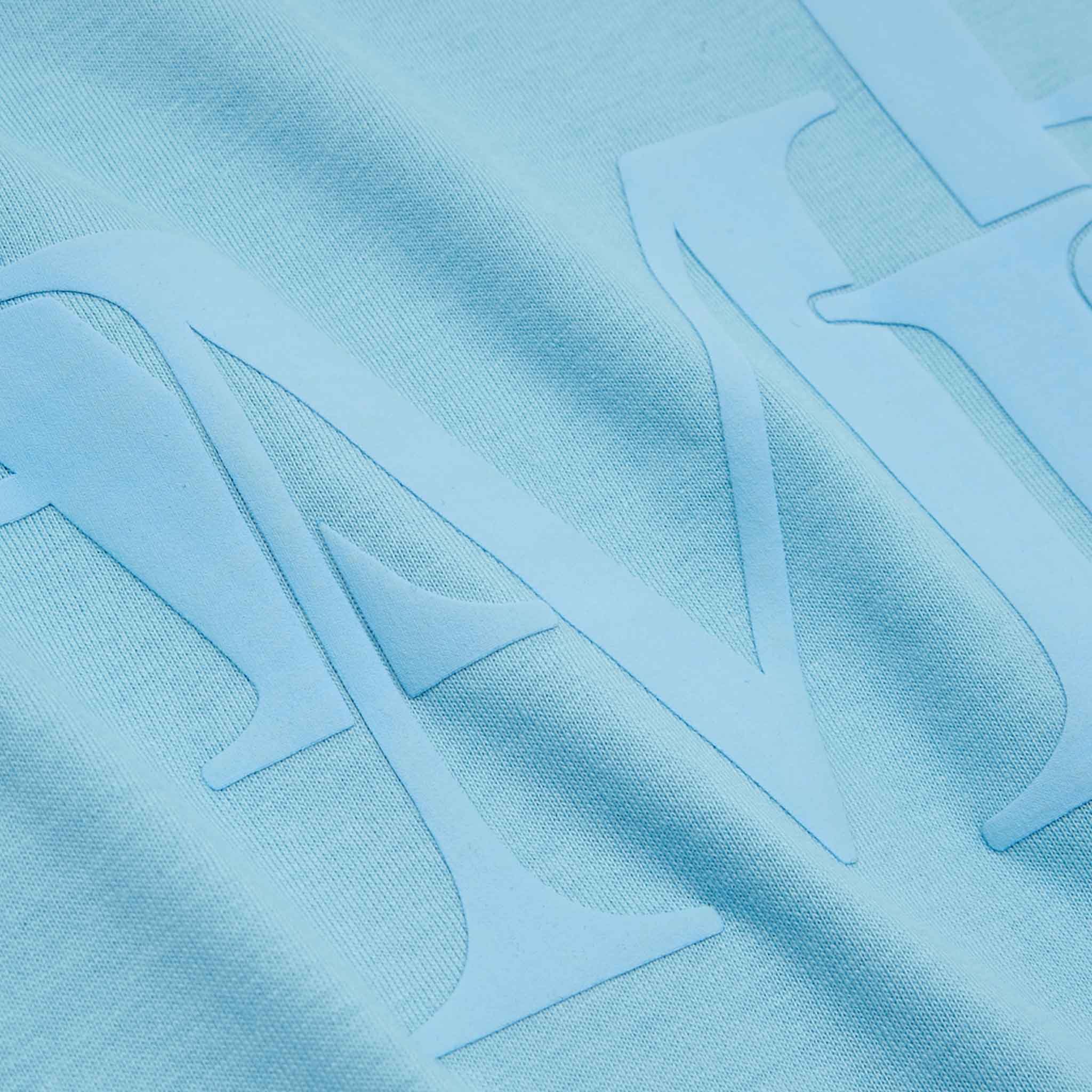 Amiri Staggered Logo T-Shirt in Air BlueT-ShirtsAmiriDPUS191846693539SAmiri Staggered Logo T-Shirt in Air Blue