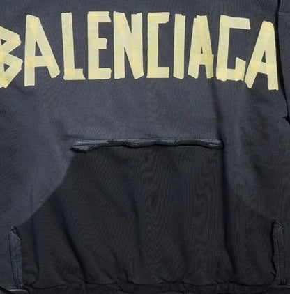 Balenciaga Tape Type Ripped Pocket Hoodie in Black