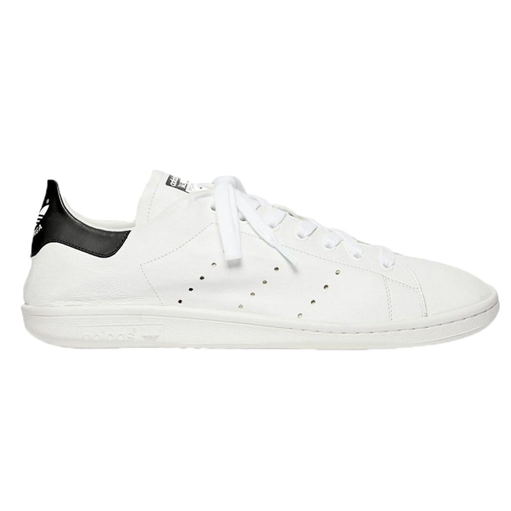 Balenciaga x Adidas Originals Stan Smith Sneakers in Optical White/ BlackSneakersBalenciagaDPUS Designer Outlet6562163535Balenciaga x Adidas Originals Stan Smith Sneakers in Optical White/ Black