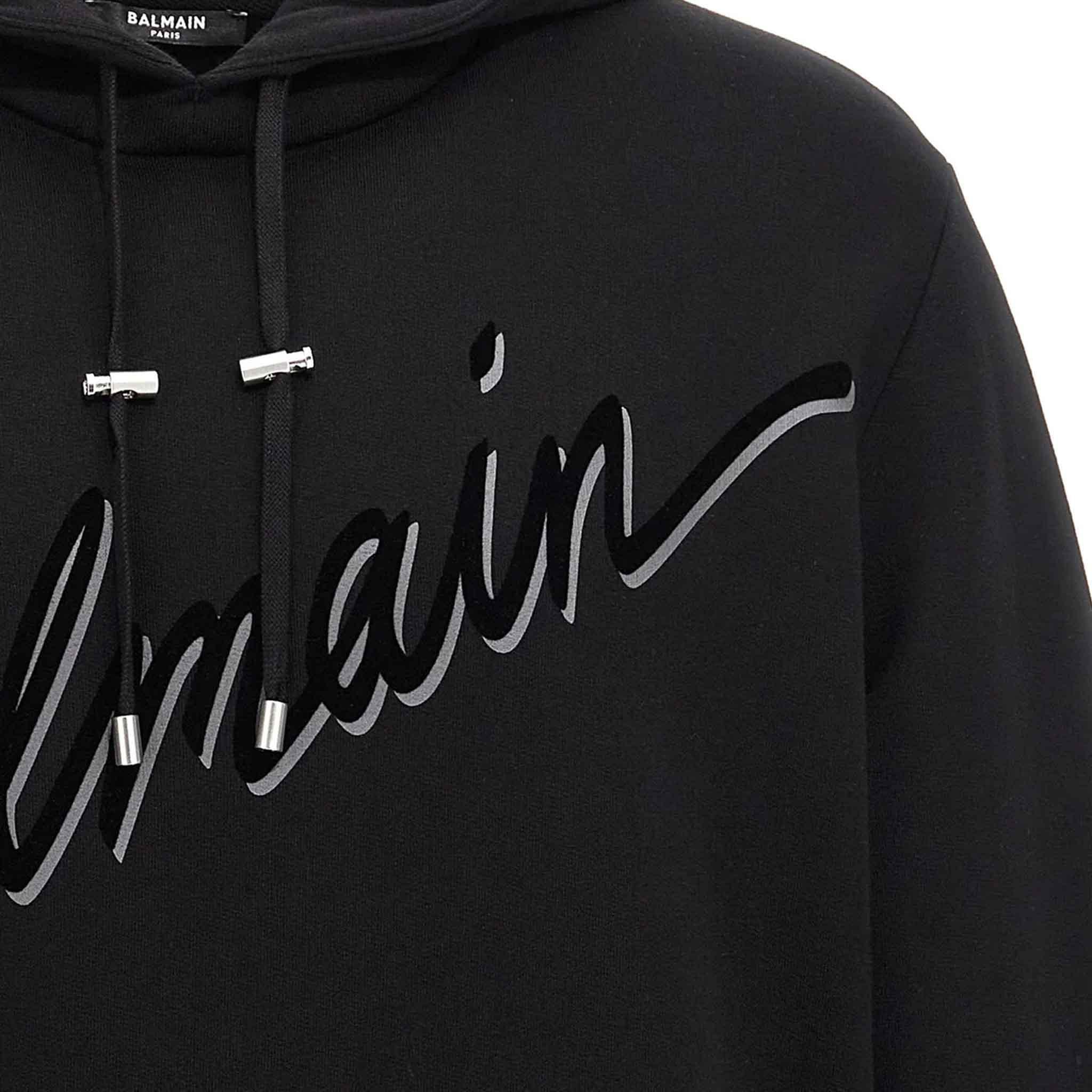 Balmain Flocked Logo Hoodie in Black