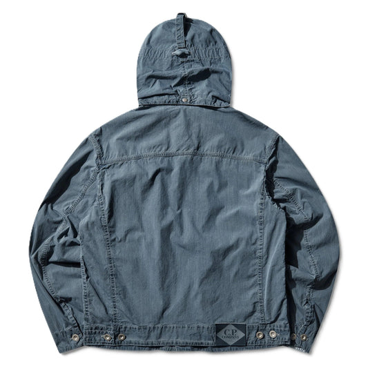 C.P. Company 50 Fili Indigo Bleached Goggle JacketCoats & JacketsC.P. CompanyDPUS Designer Outlet7622792688612Stone BleachSC.P. Company 50 Fili Indigo Bleached Goggle Jacket