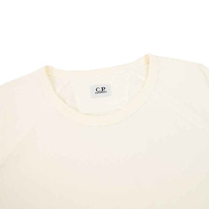 C.P. Company Arm Lens Raglan T-shirt in Off WhiteT-ShirtsC.P. CompanyDPUS72204931XSC.P. Company Arm Lens Raglan T-shirt in Off White