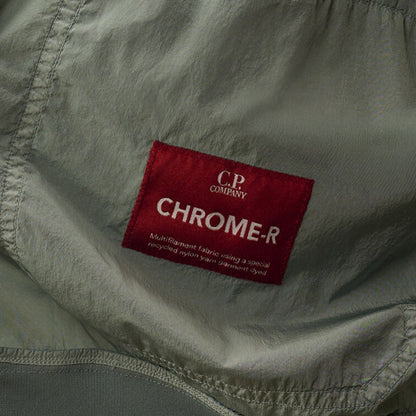 [C.P. Company] Chrome - R Button Bomber JacketCoats & JacketsC.P. CompanyDPUS Designer Outlet7622792611825Silver BlueS[C.P. Company] Chrome - R Button Bomber Jacket