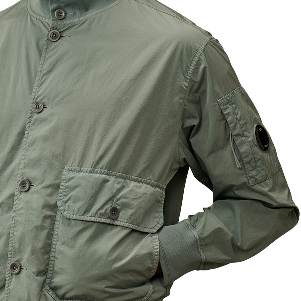 [C.P. Company] Chrome - R Button Bomber JacketCoats & JacketsC.P. CompanyDPUS Designer Outlet7622792611825Silver BlueS[C.P. Company] Chrome - R Button Bomber Jacket