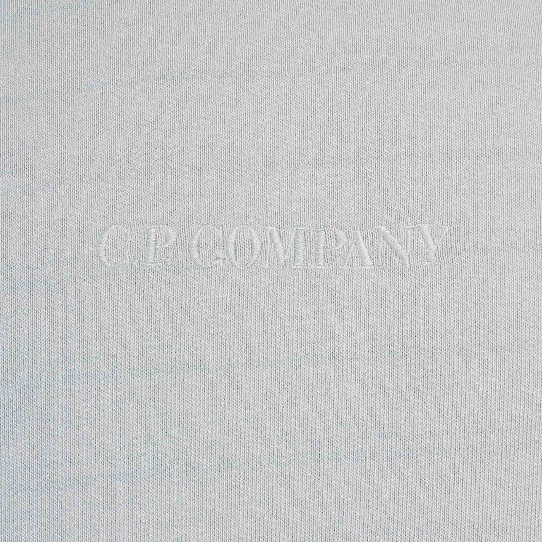 C.P. Company Cotton Fleece Sailor Man Sweatshirt in Harbour MistSweatshirtsC.P. CompanyDPUSXSC.P. Company Cotton Fleece Sailor Man Sweatshirt in Harbour Mist