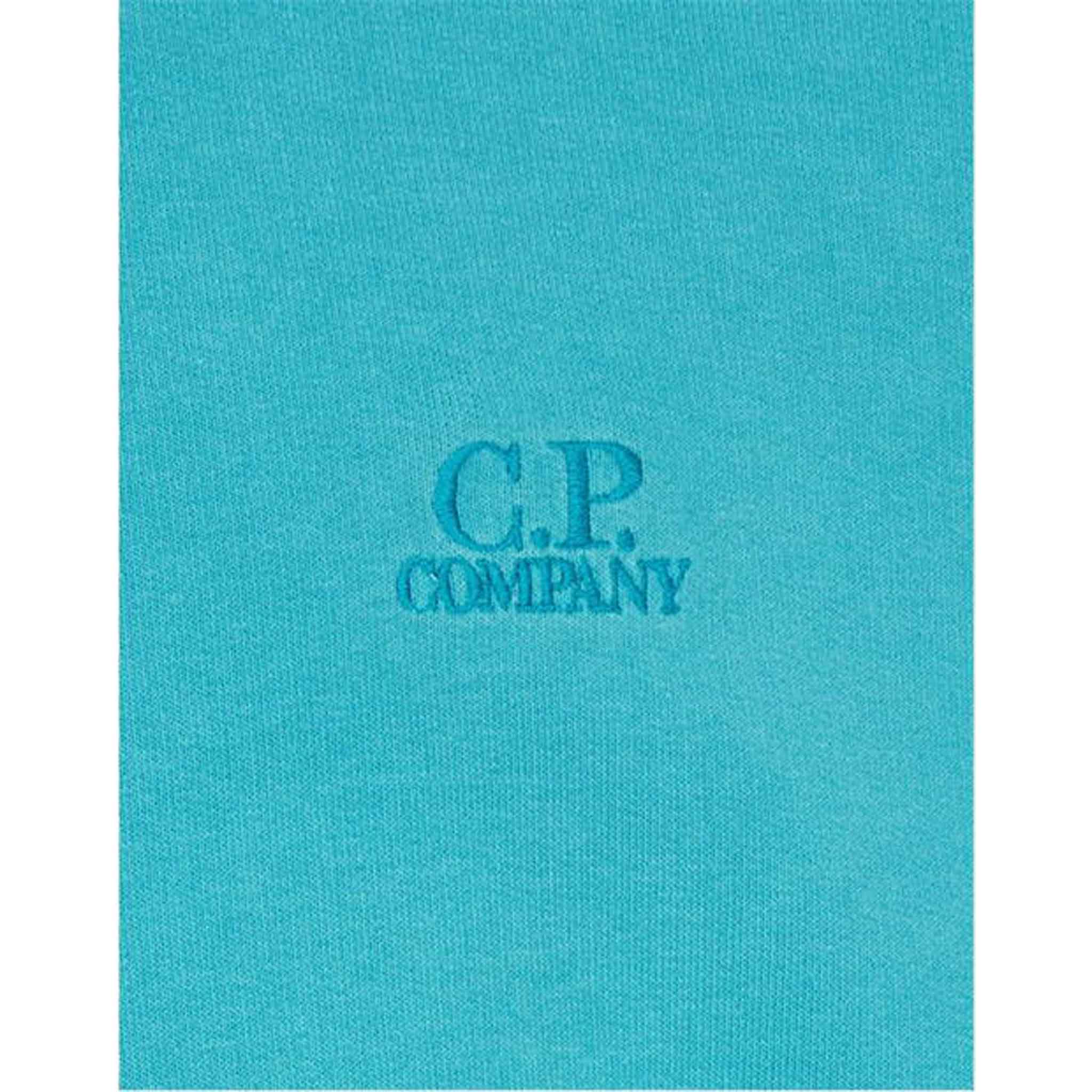 C.P. Company Cotton Resist Dyed Embroidered Logo Sweatshirt in Tile BlueSweatshirtsC.P. CompanyDPUSXSC.P. Company Cotton Resist Dyed Embroidered Logo Sweatshirt in Tile Blue