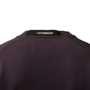 C.P. Company Diagonal Raised Fleece Crew Neck Lens Sweatshirt in Nightshade - PurpleSweatshirtsC.P. CompanyDPUS7620943860139SC.P. Company Diagonal Raised Fleece Crew Neck Lens Sweatshirt in Nightshade - Purple