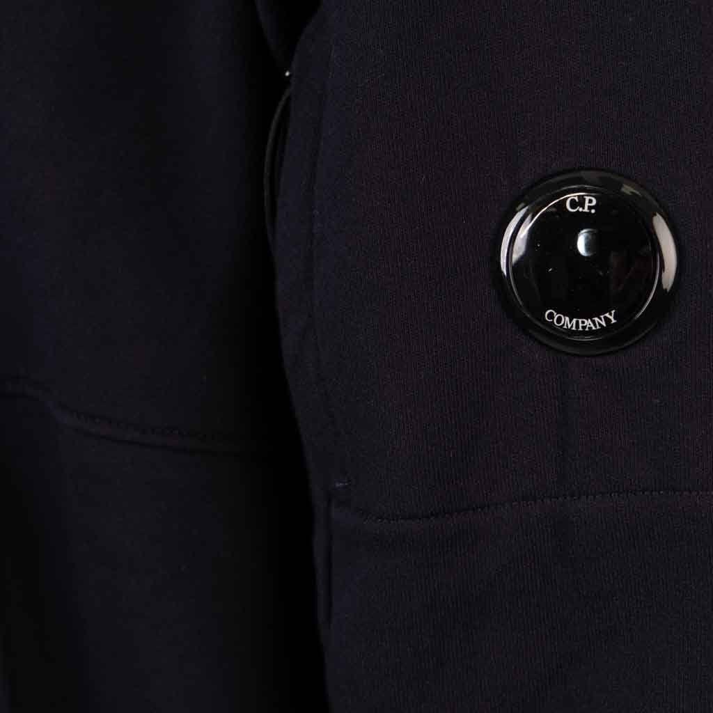 C.P. Company Diagonal Raised Fleece Lens Hooded Sweatshirt in Total EclipseHoodiesC.P. CompanyDPUS Designer Outlet7620943744309XSC.P. Company Diagonal Raised Fleece Lens Hooded Sweatshirt in Total Eclipse