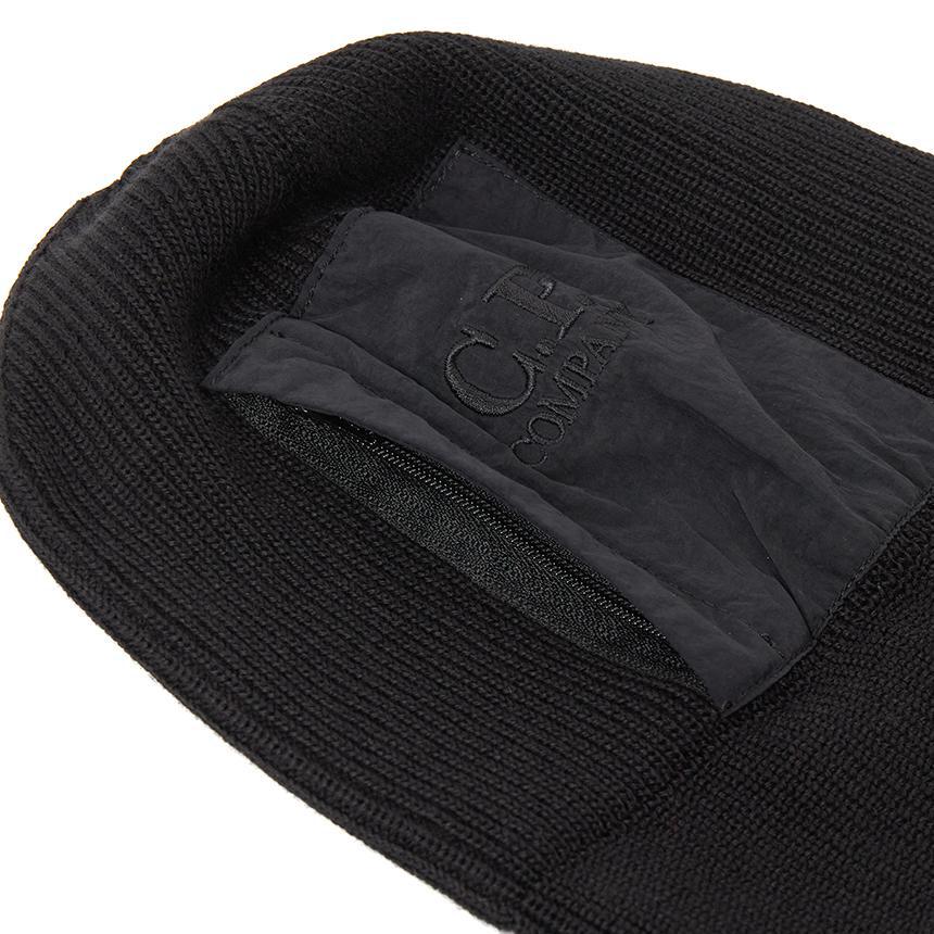 C.P. Company Extra fine Merino Wool Pocket Beanie in BlackCaps & HatsC.P. CompanyDPUS Designer Outlet7622792406766UNIC.P. Company Extra fine Merino Wool Pocket Beanie in Black