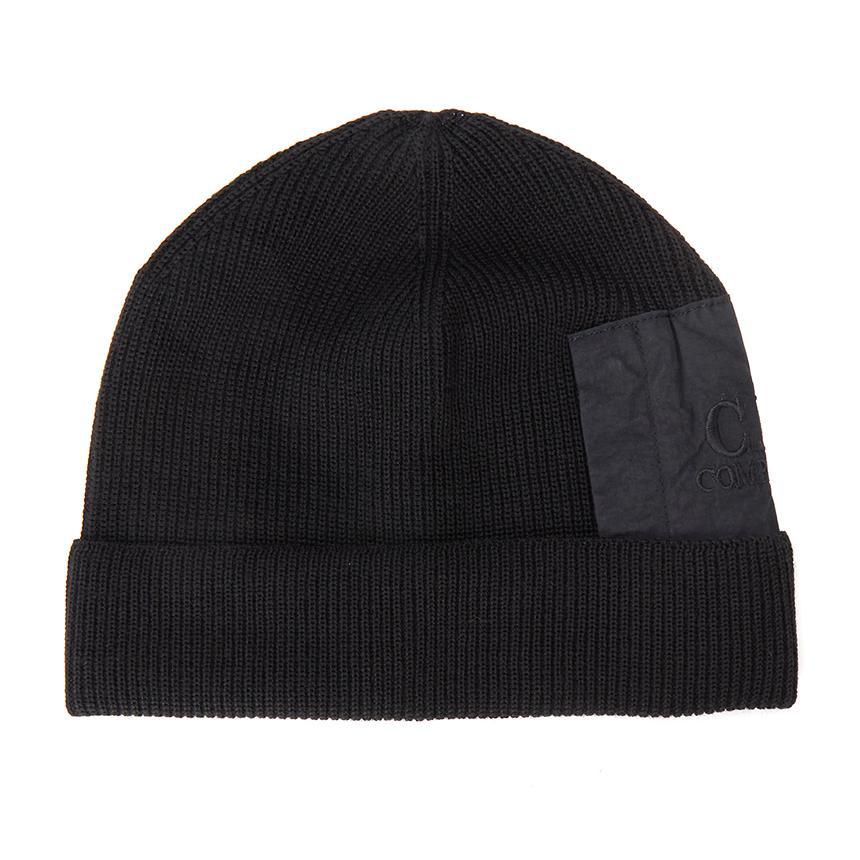C.P. Company Extra fine Merino Wool Pocket Beanie in BlackCaps & HatsC.P. CompanyDPUS Designer Outlet7622792406766UNIC.P. Company Extra fine Merino Wool Pocket Beanie in Black