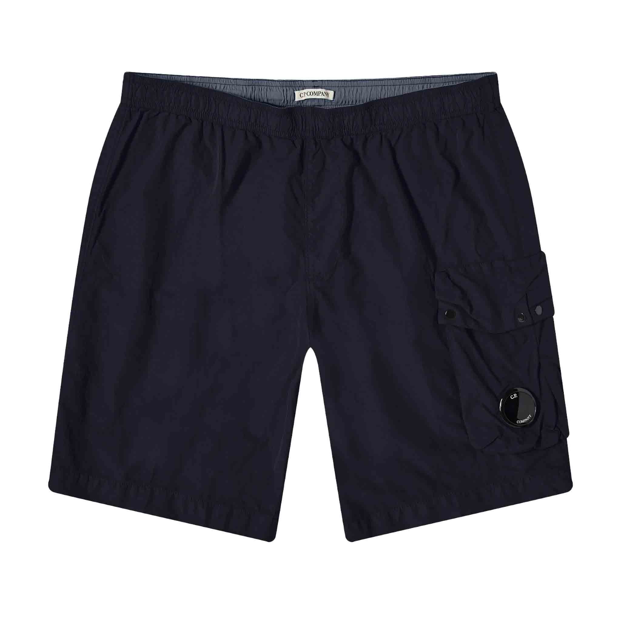 C.P. Company Flatt Nylon Cargo Swimshorts in Total Eclipse - NavyShortsC.P. CompanyDPUS44C.P. Company Flatt Nylon Cargo Swimshorts in Total Eclipse - Navy