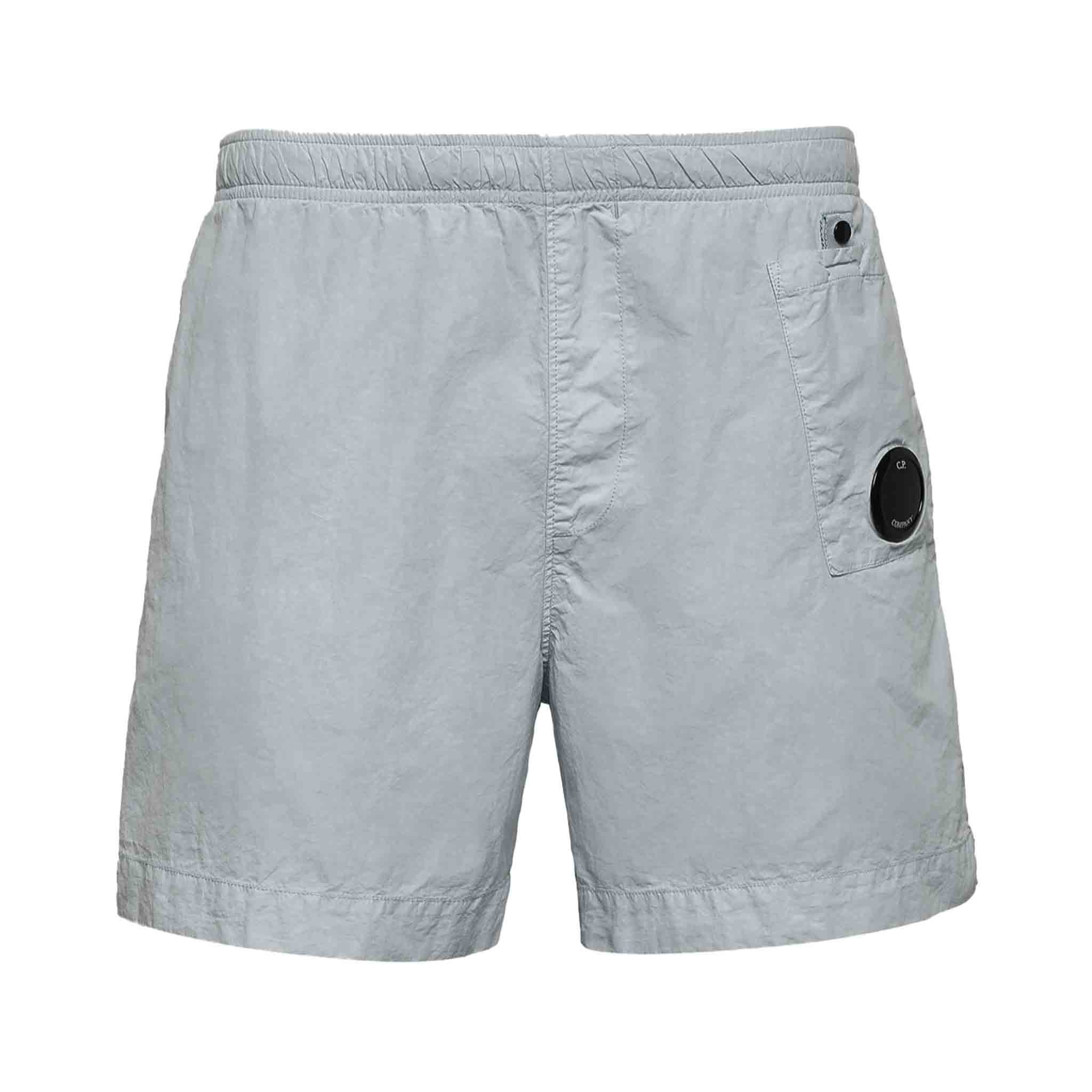 C.P. Company Flatt Nylon Lens Swimshorts in Drizzle GreyShortsC.P. CompanyDPUS44C.P. Company Flatt Nylon Lens Swimshorts in Drizzle Grey