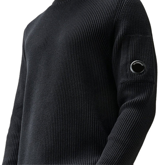 [C.P. Company] Full Rib Cotton Lens Crewneck KnitKnitwearC.P. CompanyDPUS Designer Outlet21CMKN101A-006608A-999-S7622792932791BlackS[C.P. Company] Full Rib Cotton Lens Crewneck Knit