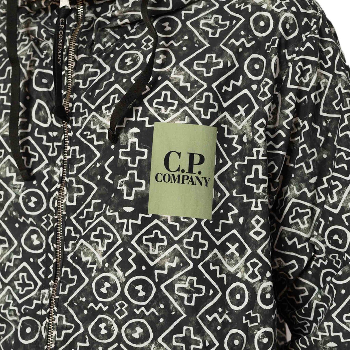 C.P. Company Inca Print Short Goggle Jacket in Agave GreenC.P. CompanyDPUS Designer Outlet762094377783344C.P. Company Inca Print Short Goggle Jacket in Agave Green
