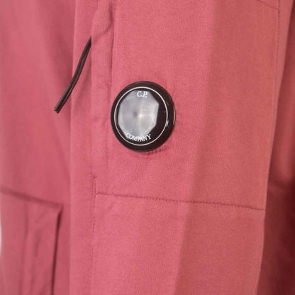 C.P. Company Light Fleece Zipped Lens Hoodie in Red Bud