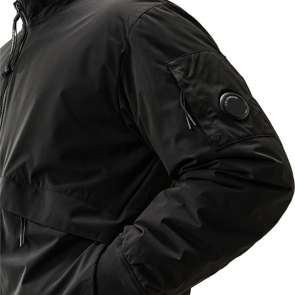[C.P. Company] Pro-Tek Primaloft® Silver Lens Bomber JacketCoats & JacketsC.P. CompanyDPUS Designer Outlet21CMOW006A-110264A-999-S7622792941823BlackS[C.P. Company] Pro-Tek Primaloft® Silver Lens Bomber Jacket