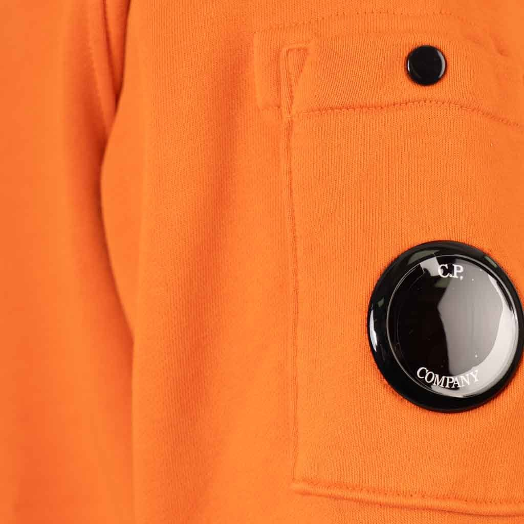 C.P. Company Resist Dyed Lens Hoodie in Orange