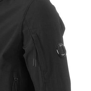 C.P. Company Shell - R Lens Hooded Jacket in BlackCoats & JacketsC.P. CompanyDPUS Designer Outlet44C.P. Company Shell - R Lens Hooded Jacket in Black