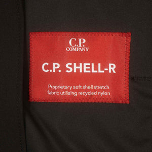 C.P. Company Shell - R Lens Hooded Jacket in BlackCoats & JacketsC.P. CompanyDPUS Designer Outlet44C.P. Company Shell - R Lens Hooded Jacket in Black