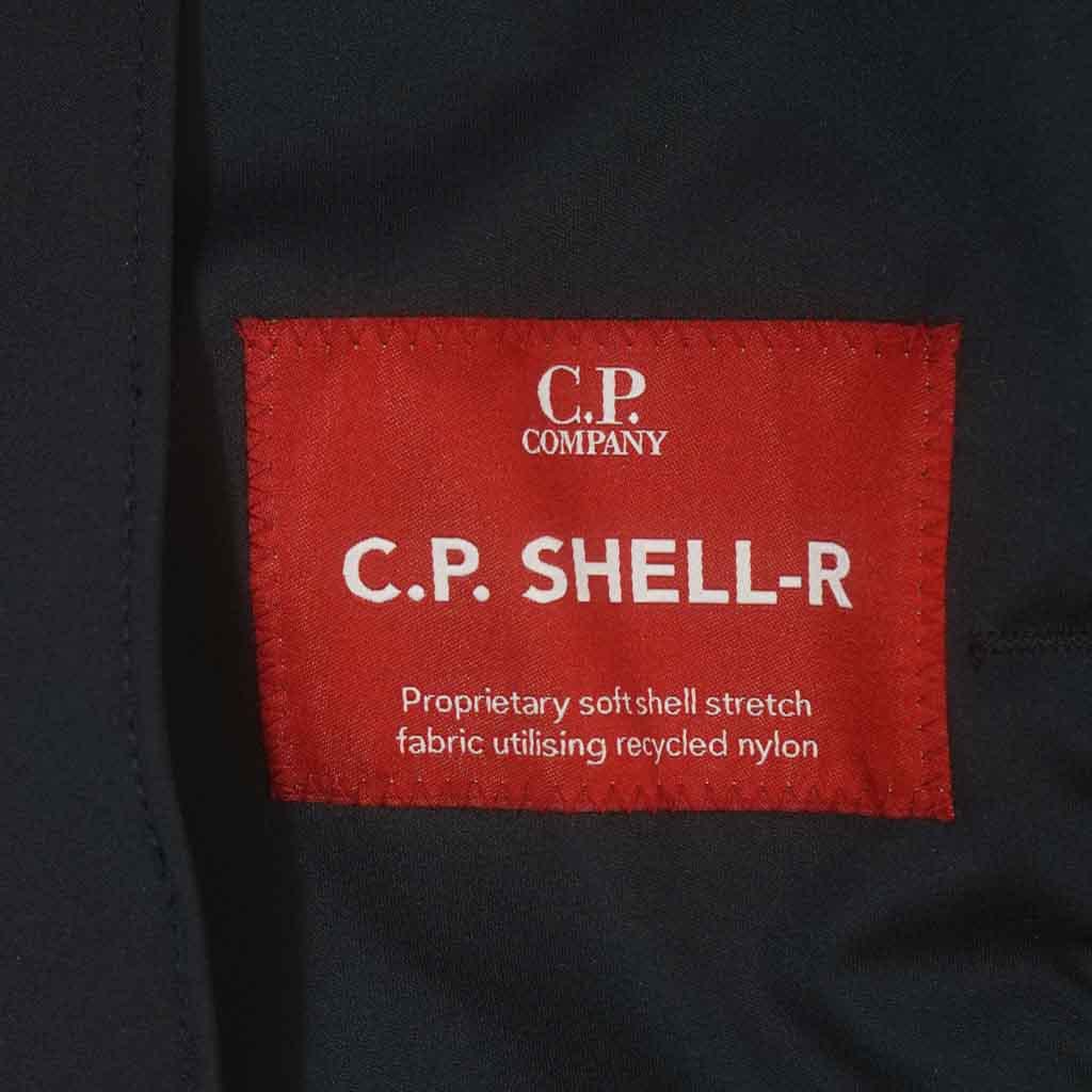 C.P. Company Shell - R Lens Hooded Jacket in Total EclipseCoats & JacketsC.P. CompanyDPUS Designer Outlet44C.P. Company Shell - R Lens Hooded Jacket in Total Eclipse