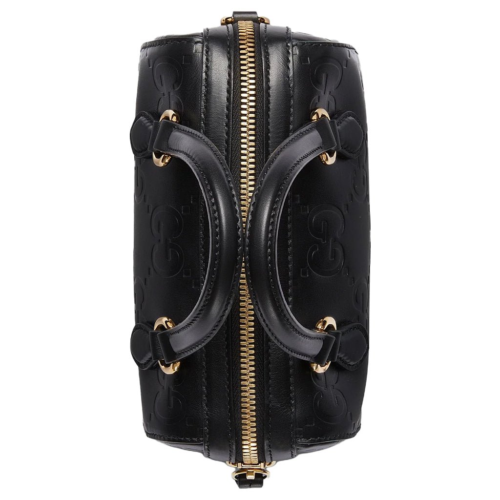 Gucci GG Embossed Leather Small Boston BagBagsGucciDPUS Designer Outlet790130-10008135308707BlackGucci GG embossed black leather small Boston bag top view with dual handles and gold zipper.