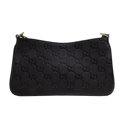Gucci GG Leather Shoulder BagBagsGucciDPUS Designer Outlet815277-10008137462274BlackGucci GG embossed black leather shoulder bag showing gold-tone hardware, front view