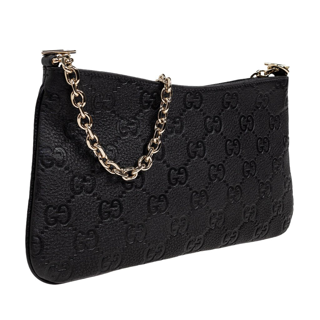 Gucci GG Leather Shoulder BagBagsGucciDPUS Designer Outlet815277-10008137462274BlackGucci GG embossed black leather shoulder bag with gold-tone chain strap, side angle view