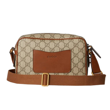 Gucci GG Monogram Crossbody Camera BagBagsGucciDPUS Designer Outlet821216-97838137803624BrownGucci GG Supreme canvas crossbody bag with brown leather front pocket, gold hardware, and wide adjustable webbing strap