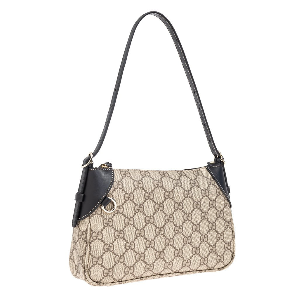 Gucci GG Monogram Shoulder BagBagsGucciDPUS Designer Outlet815218-97658137135656BlackGucci GG Supreme canvas shoulder bag side angle with black leather trim, gold hardware and single strap.