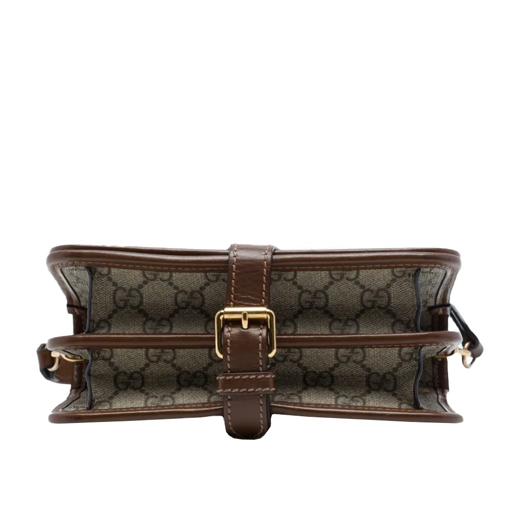 Gucci GG Supreme Monogram Crossbody Shoulder BagBagsGucciDPUS Designer Outlet671620-85638101485227BrownGucci GG Supreme canvas crossbody bag top view with brown leather strap and gold buckle.