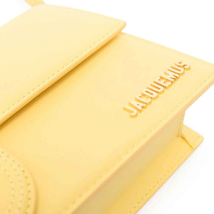 Jacquemus Le Bambino Long Shoulder Bag in YellowHandbagsJacquemusDPUS Designer Outlet3700943112583Jacquemus Le Bambino Long Shoulder Bag in Yellow