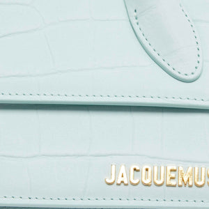 Jacquemus Le Chiquito Long Bag in Light Blue SuedeHandbagsJacquemusDPUS Designer Outlet37009431004154Jacquemus Le Chiquito Long Bag in Light Blue Suede