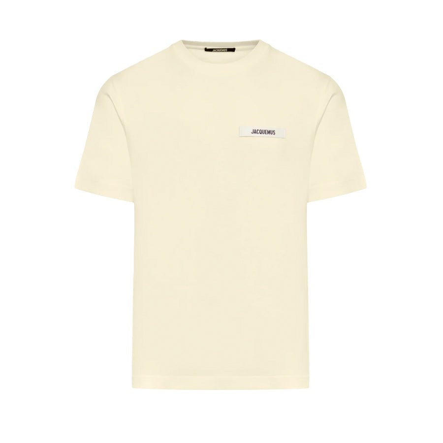 Jacquemus The Gros Grain Logo T-Shirt in BeigeT-ShirtsJacquemusDPUS3700943386090SJacquemus The Gros Grain Logo T-Shirt in Beige