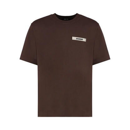 Jacquemus The Gros Grain Logo T-Shirt in BrownT-ShirtsJacquemusDPUS Designer Outlet3700943763020XSJacquemus The Gros Grain Logo T-Shirt in Brown
