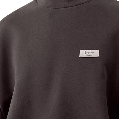 [Jacquemus] The Montaigne SweatshirtSweatshirtsJacquemusDPUS Designer OutletSSU00215AJ00325-881-S3667567036094Dark BrownS[Jacquemus] The Montaigne Sweatshirt