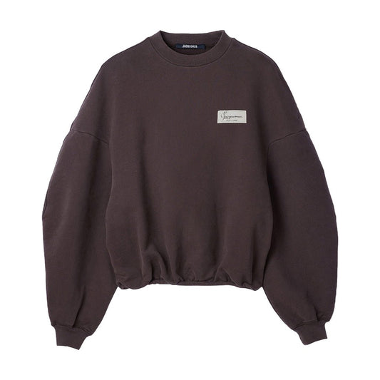 [Jacquemus] The Montaigne SweatshirtSweatshirtsJacquemusDPUS Designer OutletSSU00215AJ00325-881-S3667567036094Dark BrownS[Jacquemus] The Montaigne Sweatshirt