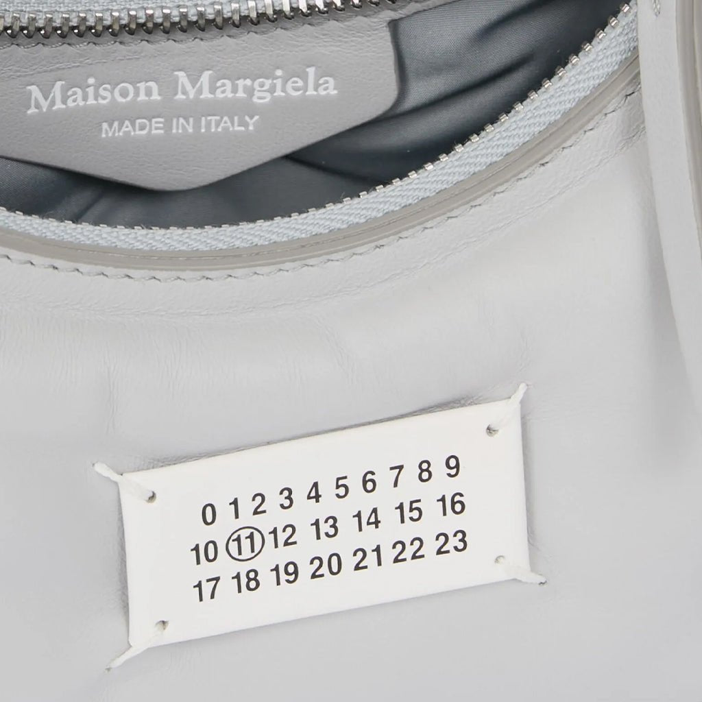 Maison Margiela Glam Slam Hobo Micro BagBagsMaison MargielaDPUS Designer OutletSB1WG0021-P4300-H9677-OS8053460388395GreigeOne SizeMaison Margiela Glam Slam Hobo Micro Bag