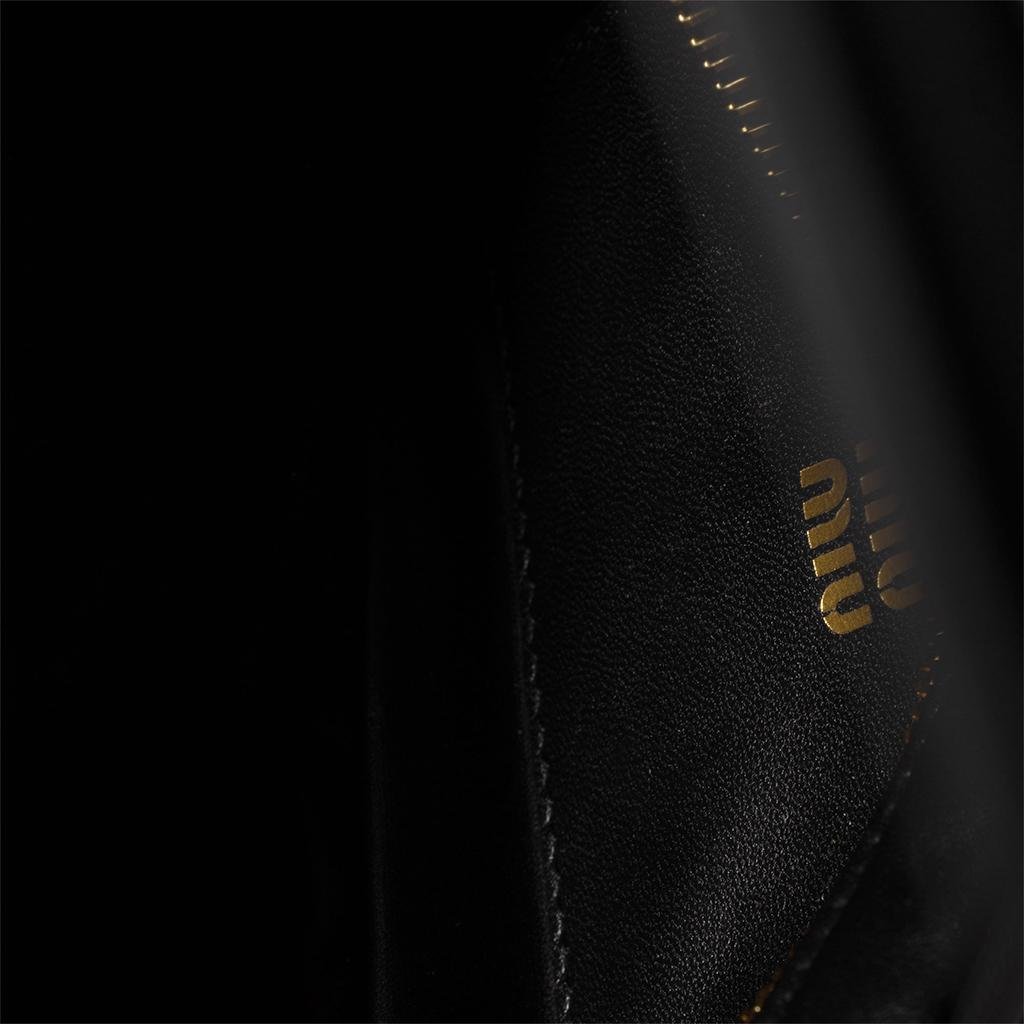 Miu Miu Matelassé Nappa Leather PouchBagsMiu MiuDPUS Designer Outlet1541267853488056811127735BlackMiu Miu Matelassé Nappa Leather Pouch