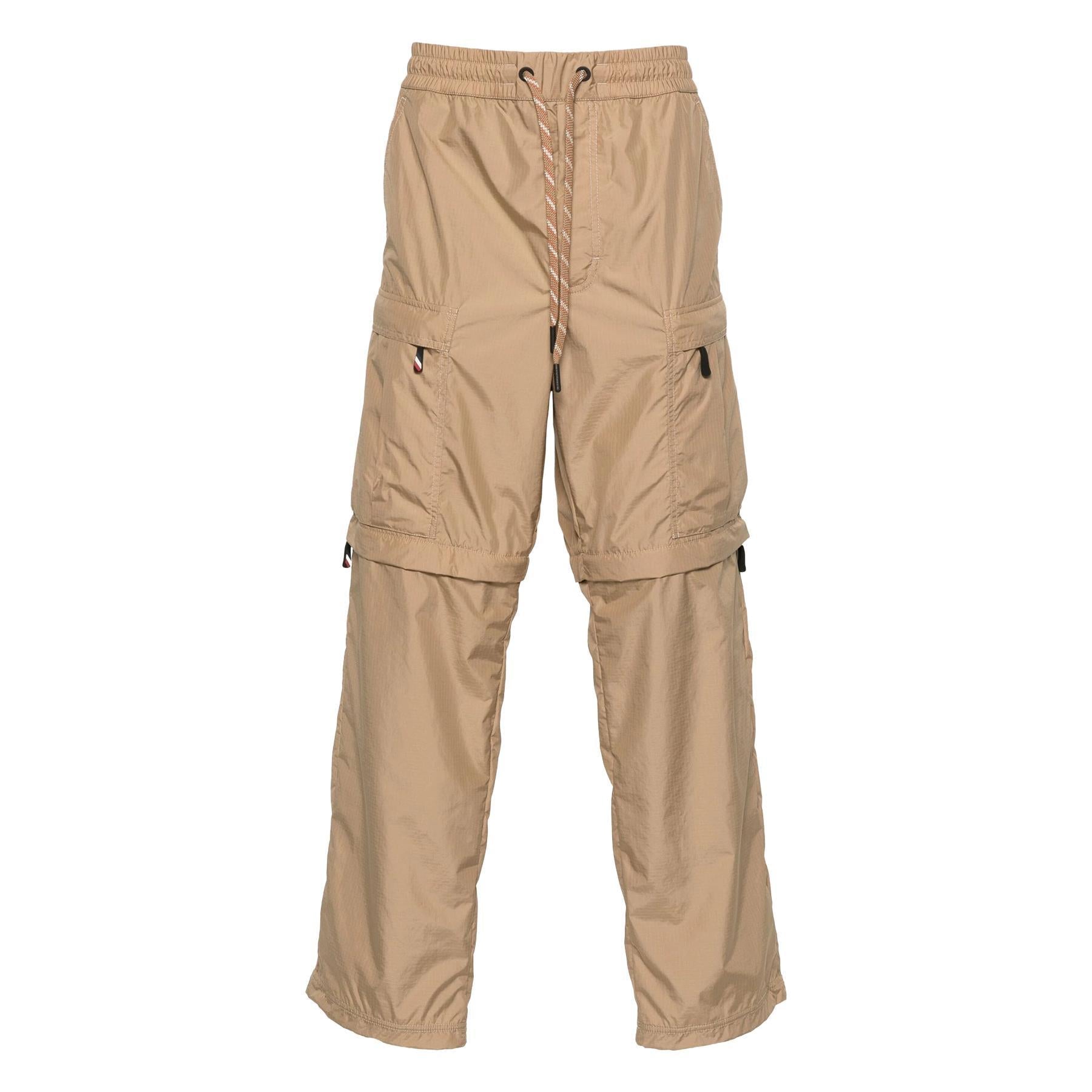 Moncler Grenoble Men's Nylon Cargo Trousers With Deatchable Panels in BeigeMonclerDPUS Designer Outlet203001211958055724266531MMoncler Grenoble Men's Nylon Cargo Trousers With Deatchable Panels in Beige