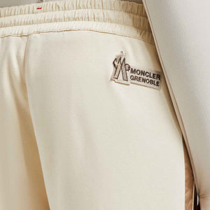 Moncler Grenoble Women's Mountain Logo Padded Cotton Track Pants in Off WhiteSweatpantsMonclerDPUS Designer Outlet8055724764860XSMoncler Grenoble Women's Mountain Logo Padded Cotton Track Pants in Off White