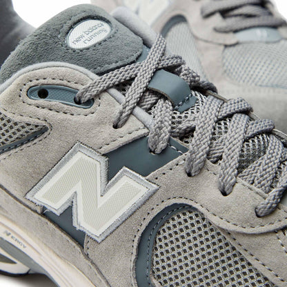 New Balance M2002 in GreyNew BaanceDPUS Designer Outlet19643215246940New Balance M2002 in Grey