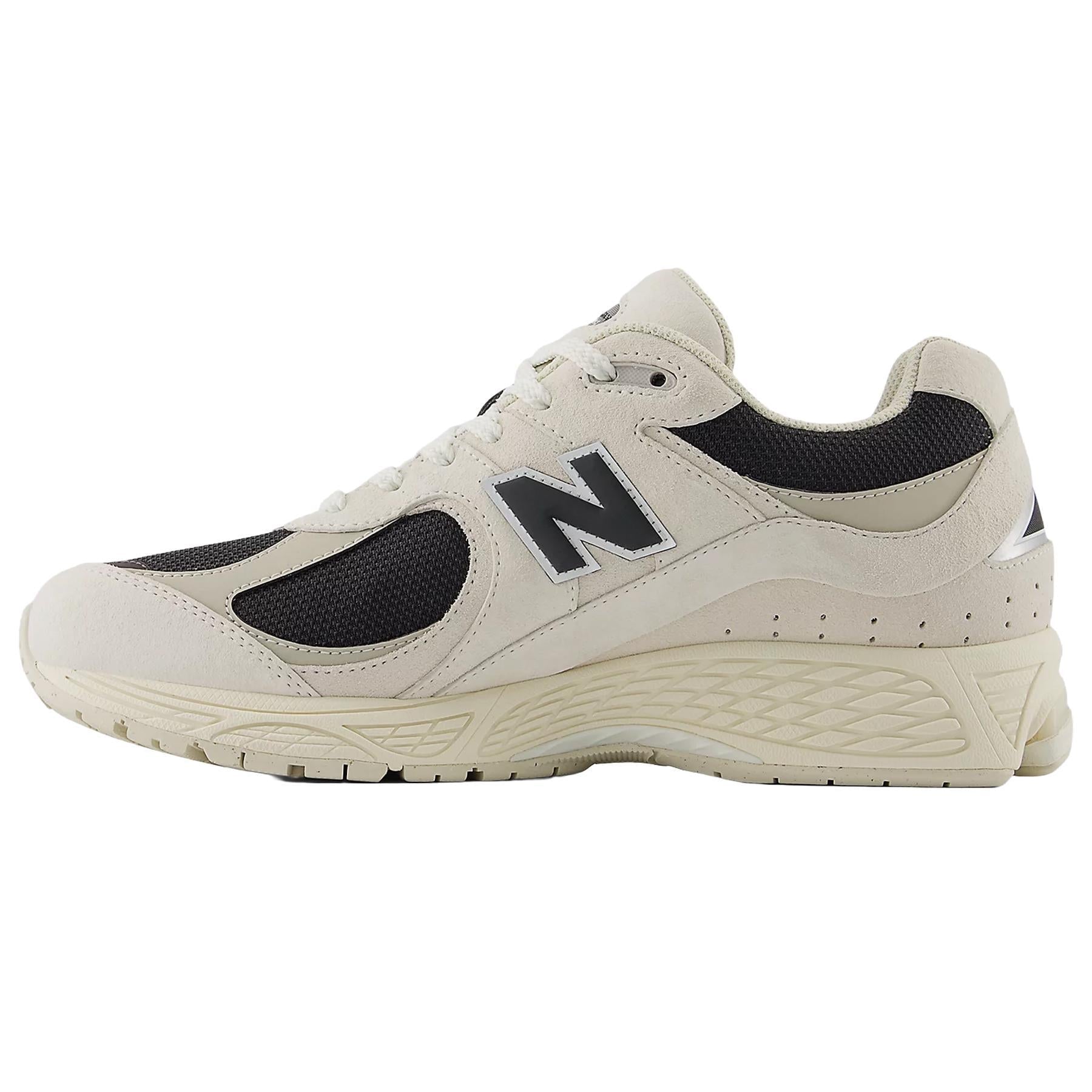 New Balance U2002 in Cream - BlackNew BaanceDPUS Designer Outlet19868640462241.5New Balance U2002 in Cream - Black