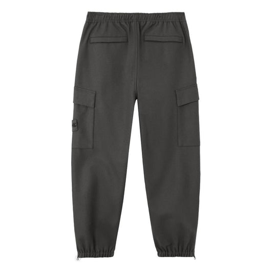 Stone Island Ghost Flannel Loose Fit Trousers with Elasticated Zipped Cuffs in Dark GreyTrousersStone IslandDPUS Designer Outlet805381348634128Stone Island Ghost Flannel Loose Fit Trousers with Elasticated Zipped Cuffs in Dark Grey